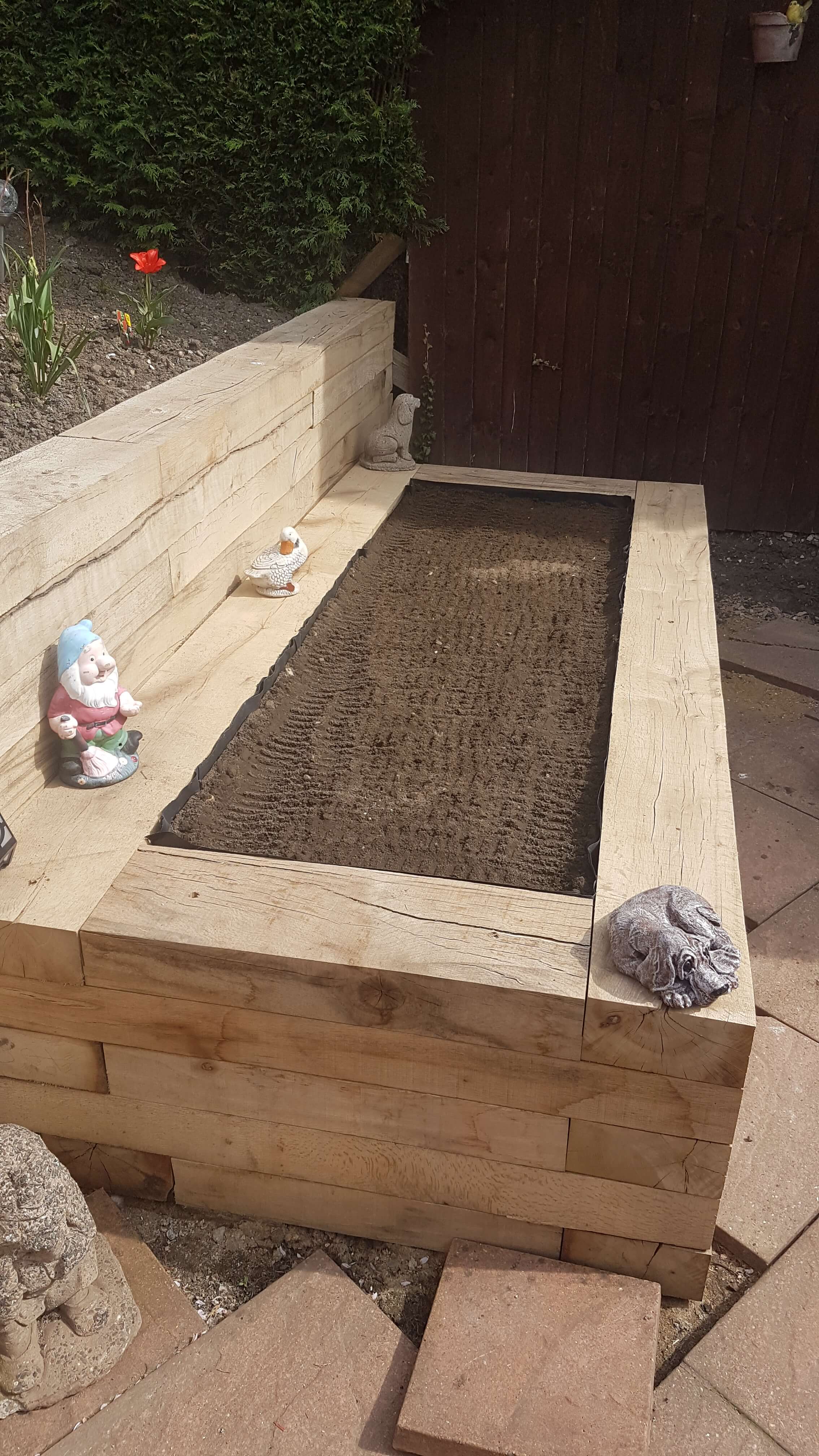 Planter built from green oak railway sleepers